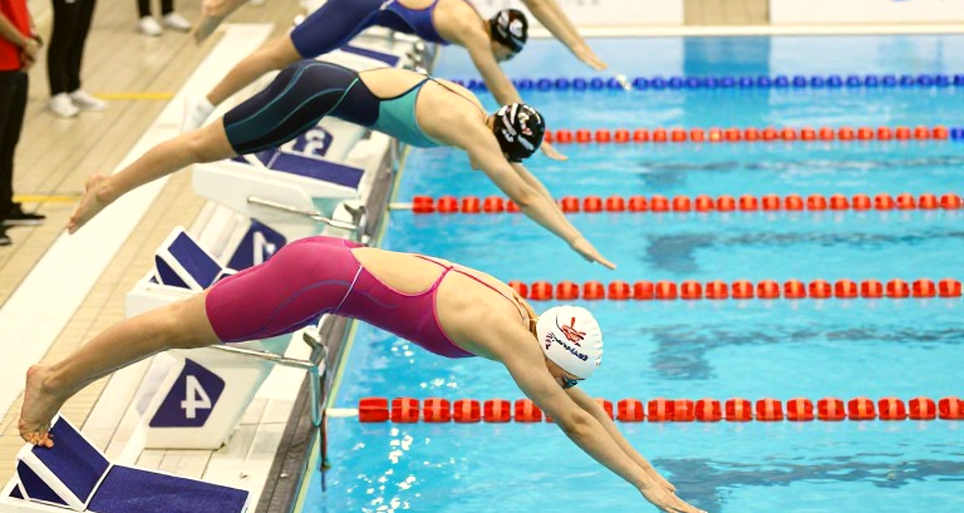 Youth Swimming and the Puberty Trap: Re-reading Age-Group Records Through Three Layers of Data Youth Swimming and the Puberty Trap: Re-reading Age-Group Records Through Three Layers of Data